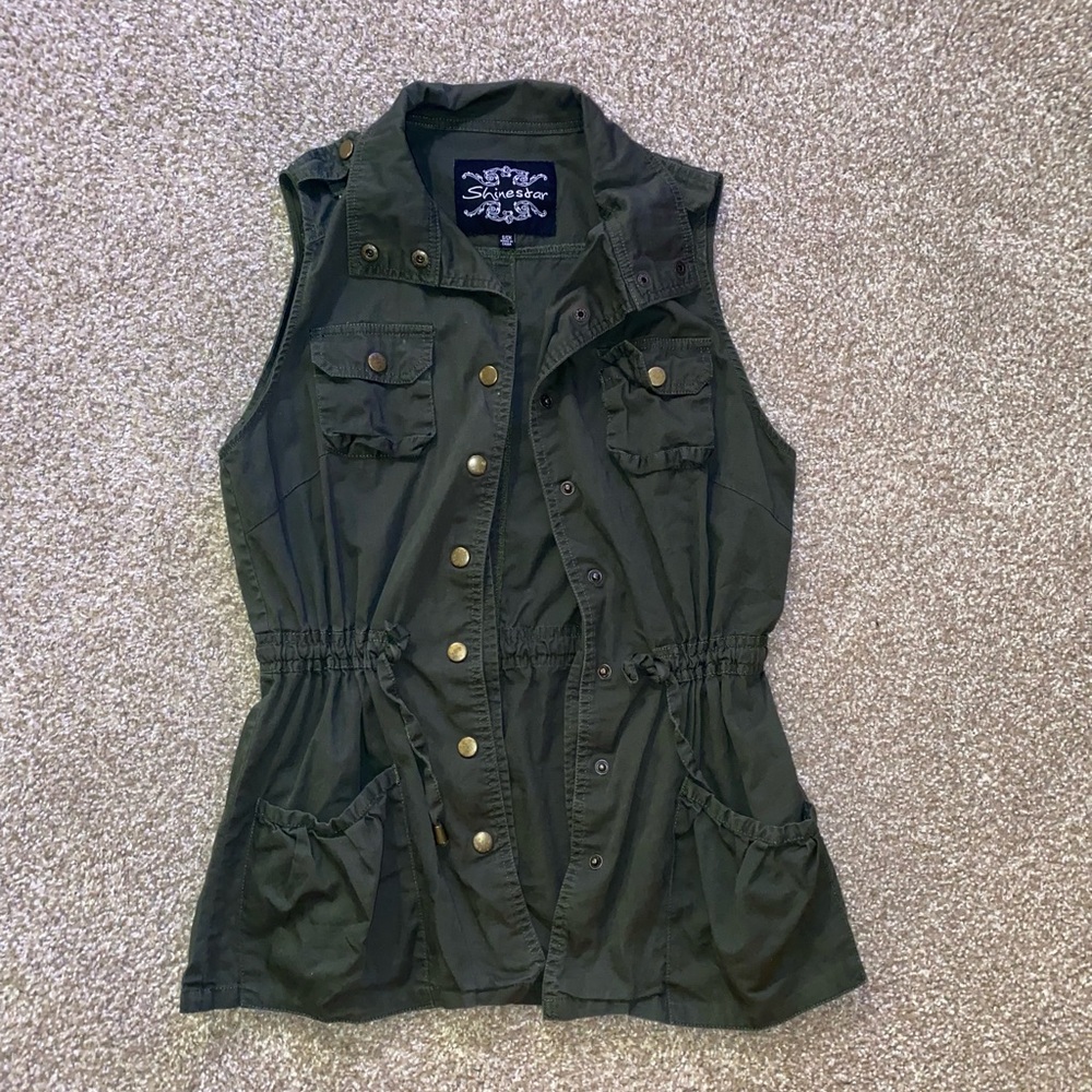 Olive green, throw over vest, longer with drawstrings at waist.